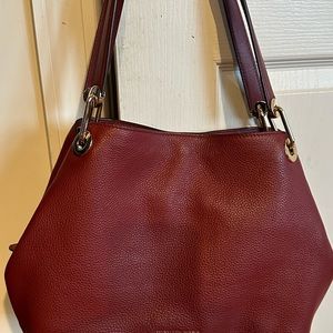 Nice satchel bag by Michael Kors very Roomy three compartments